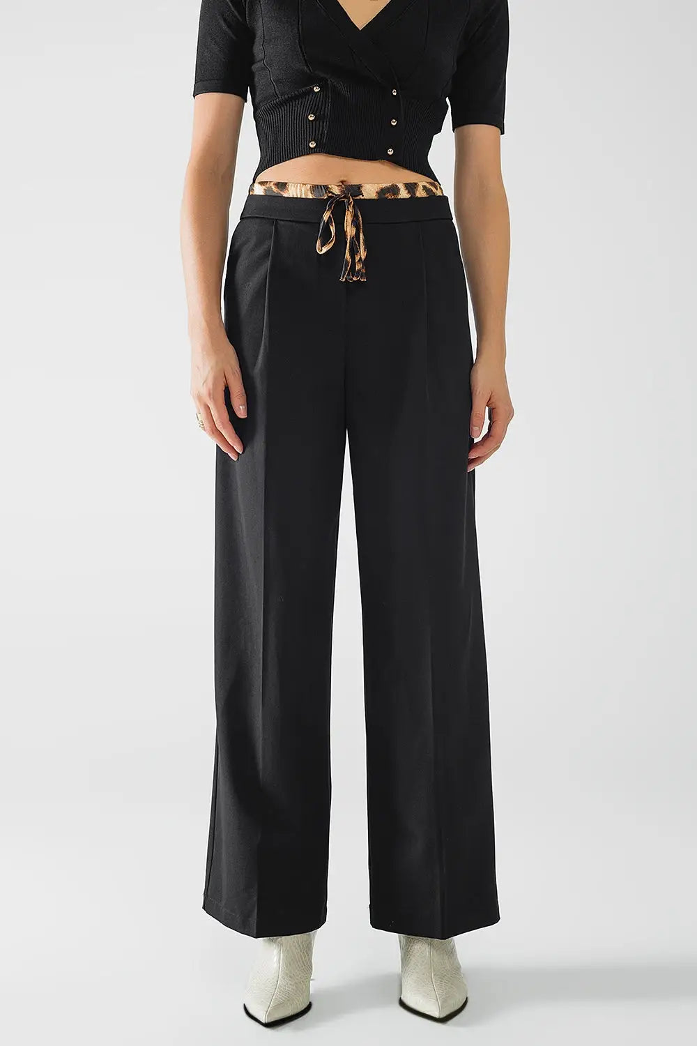 Long black pleated pants with leopard detail at the waist - Pants