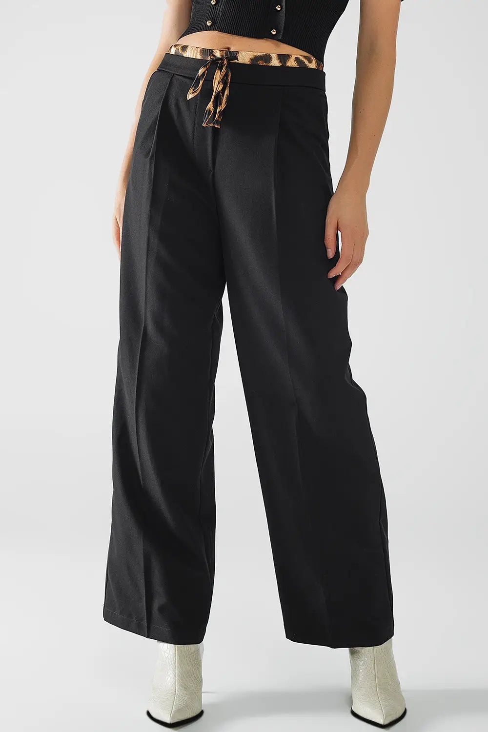 Long black pleated pants with leopard detail at the waist - Pants