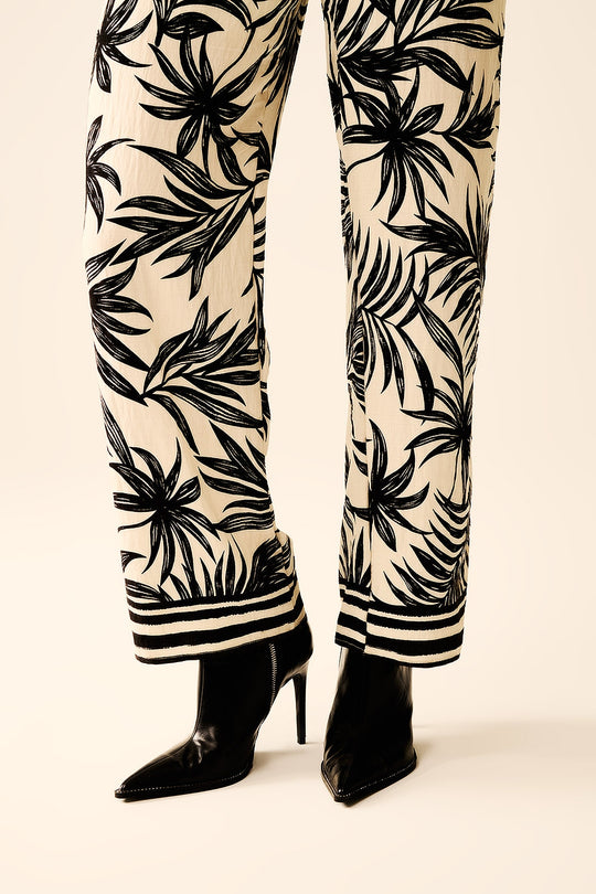 Tropical Motif Short Sleeve Jumpsuit in black and white