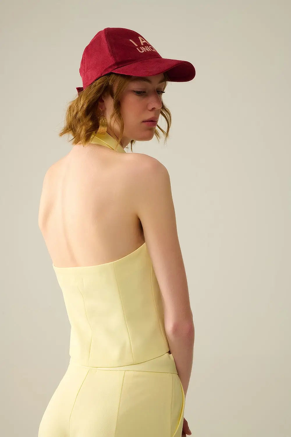 Yellow wrap vest with detailed gold button - Tops