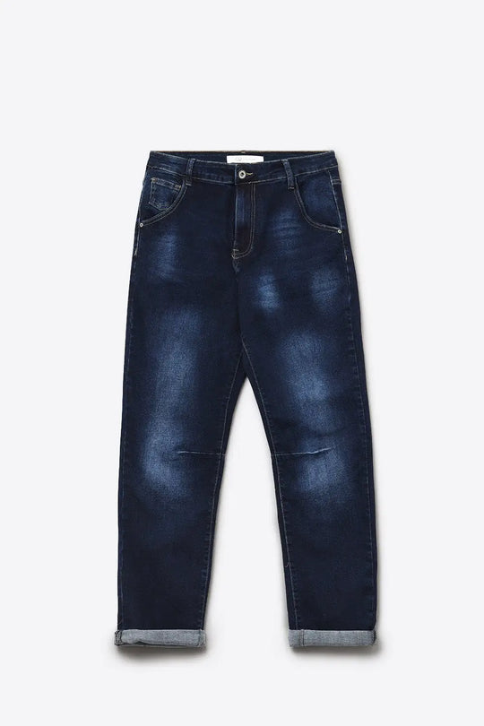 Dark wash jeans with contrast stitching and cuffed hems