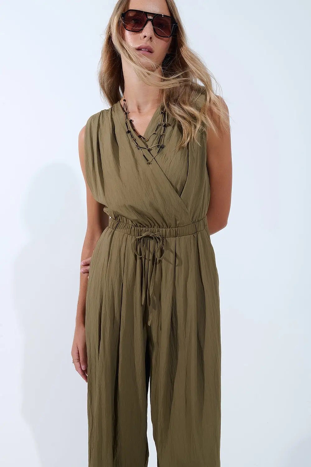 draped olive jumpsuit in crinkled fabric - Jumpsuits