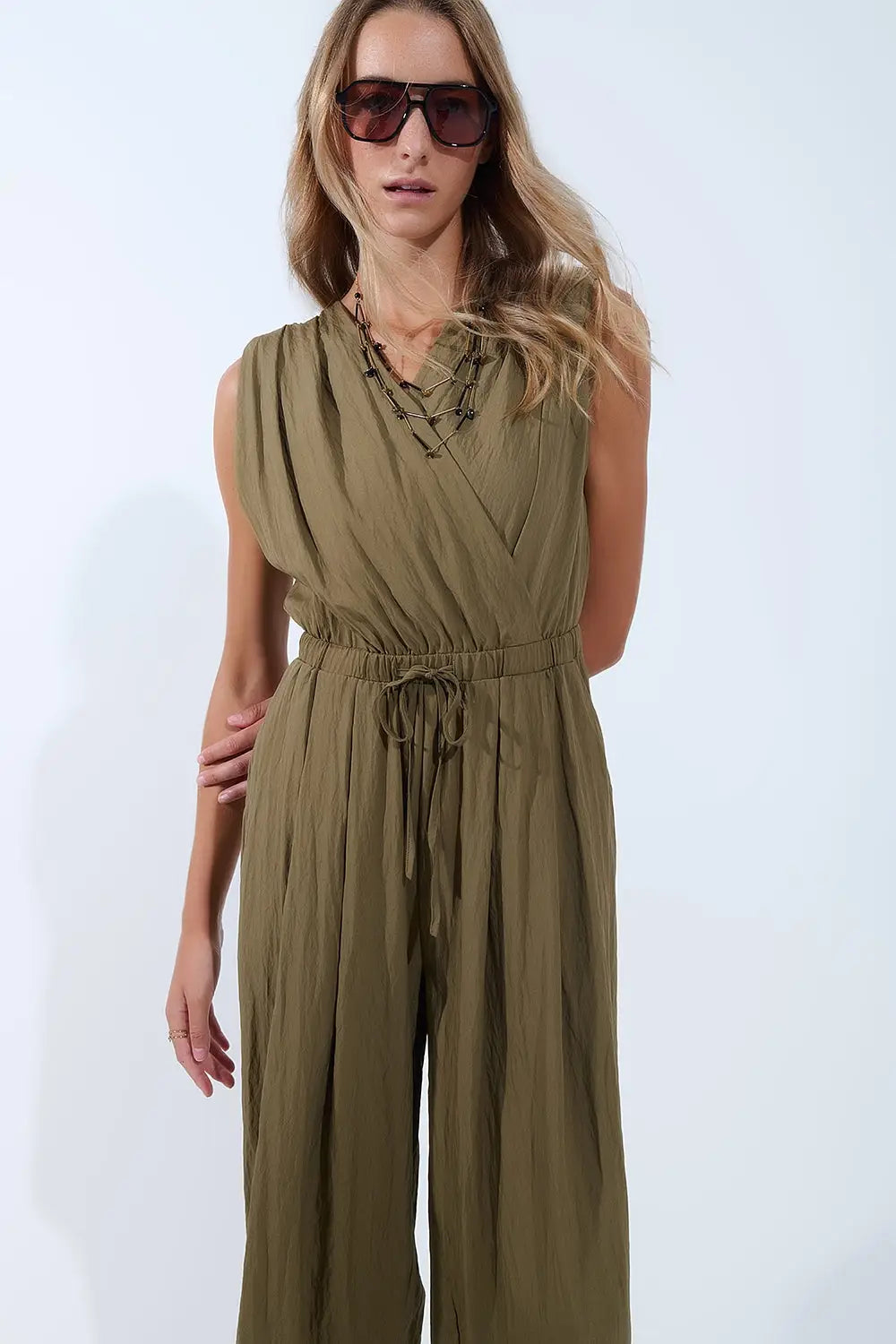 draped olive jumpsuit in crinkled fabric - Jumpsuits