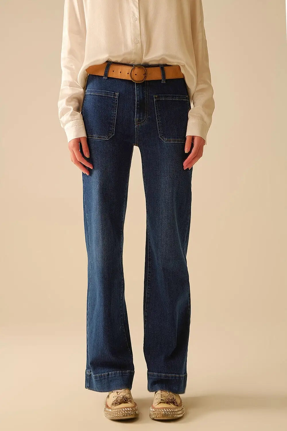 Dark wash jeans with wide leg and pockets