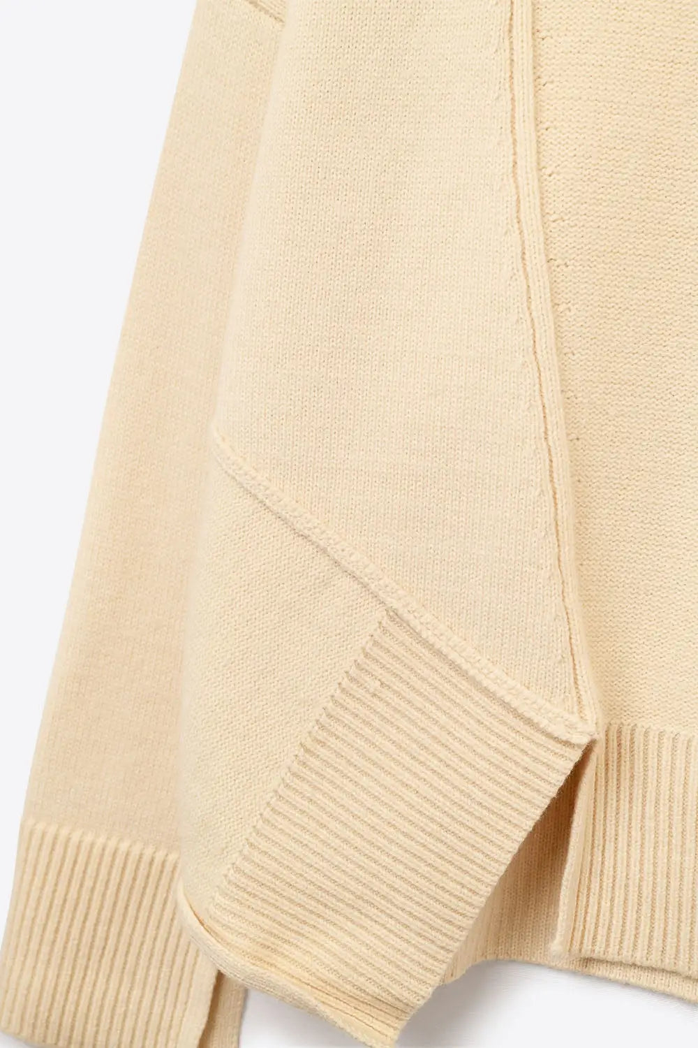 Soft knitted Asymmetric Turtleneck Sweater in beige - Sweaters