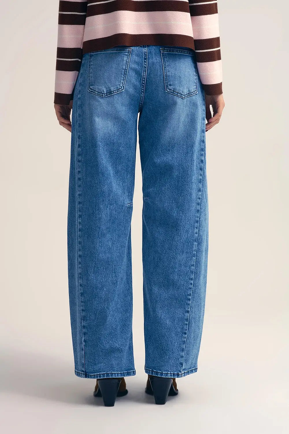 Straight barrel-style jeans with knee stitching detail