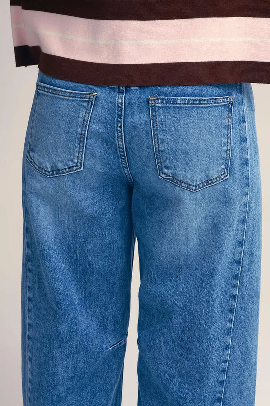 Straight barrel-style jeans with knee stitching detail