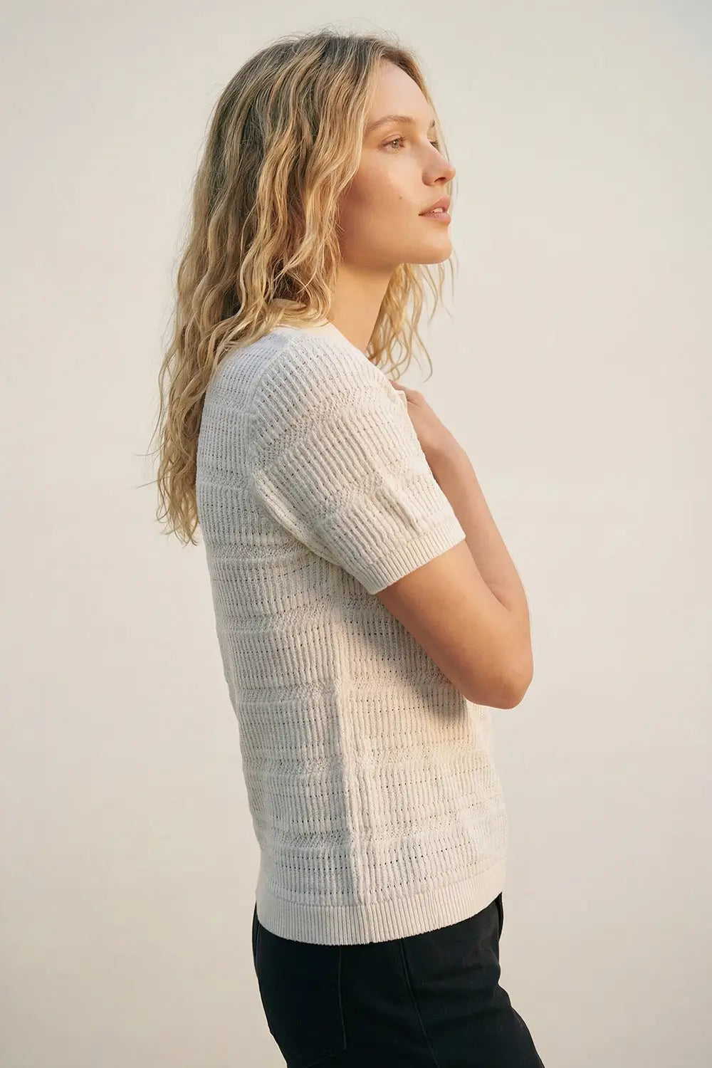 White polo shirt with short sleeves and open knit pattern - Sweaters