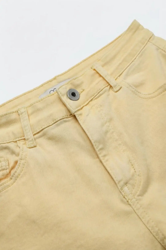 Stretch-denim Bermuda shorts in Butter Yellow - Pants