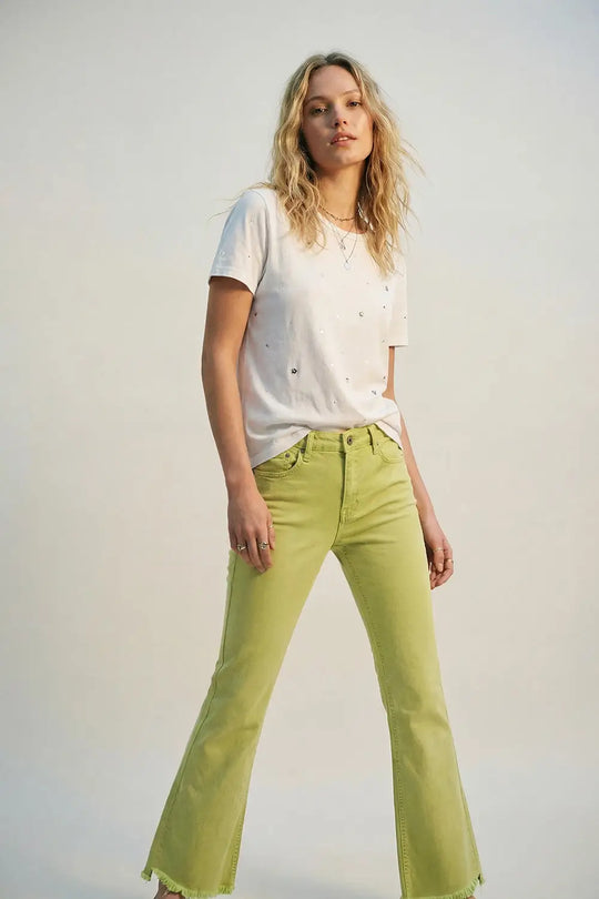 Flare jeans with raw hem edge in lime color - Colored Jeans