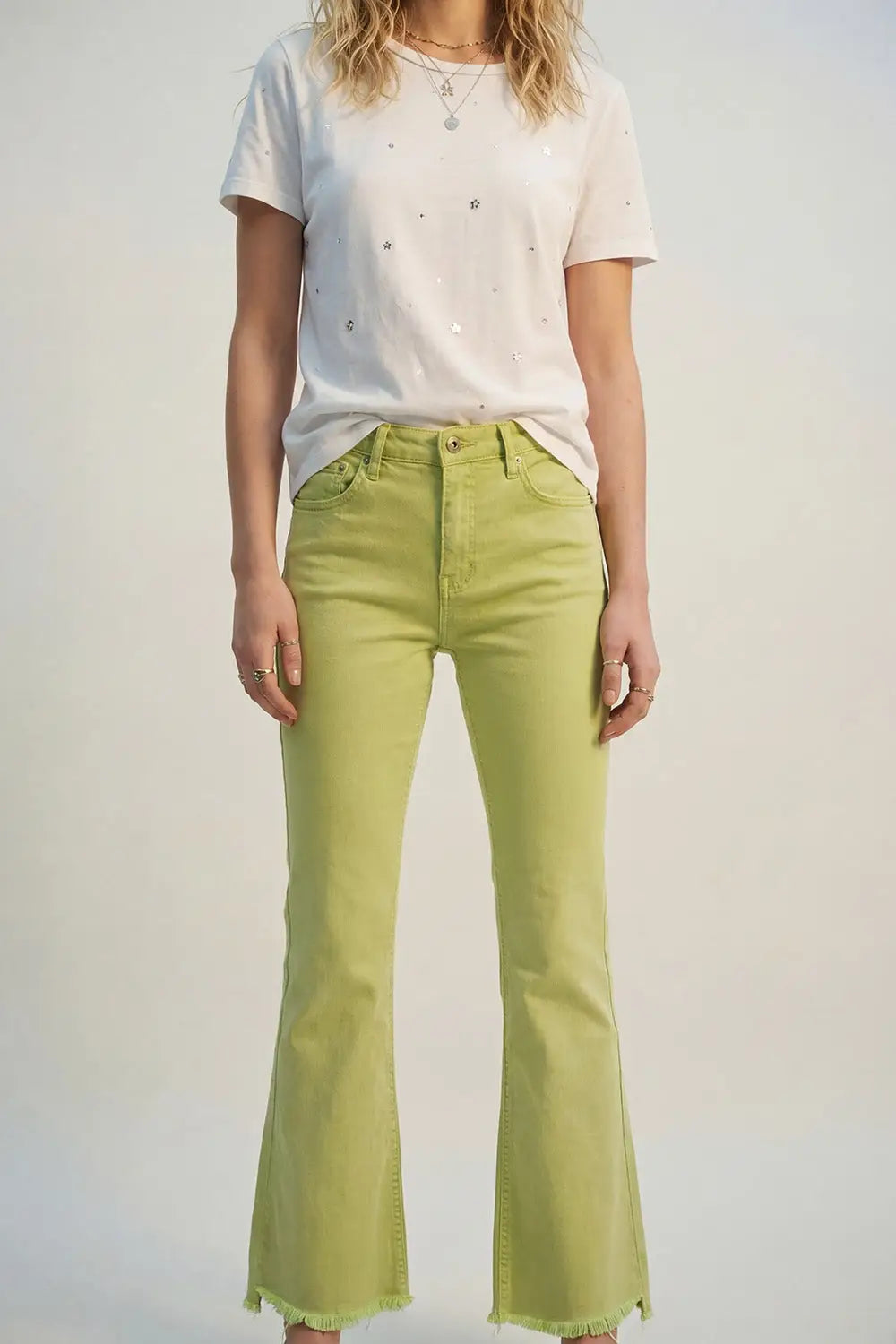 Flare jeans with raw hem edge in lime color - Colored Jeans