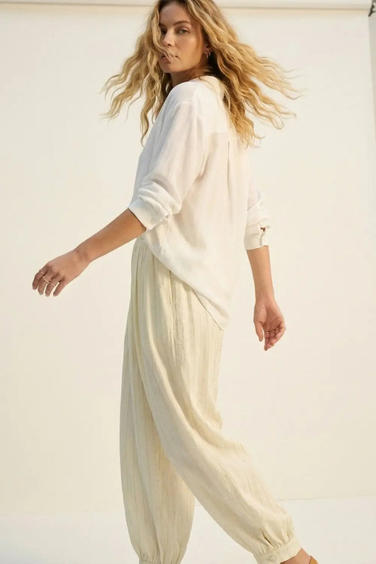 Cream Textured High-Waist Balloon Pants with Buttoned Cuffs - Pants