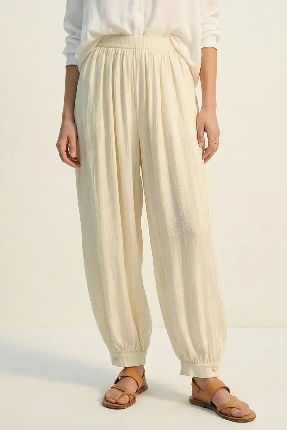 Cream Textured High-Waist Balloon Pants with Buttoned Cuffs - Pants