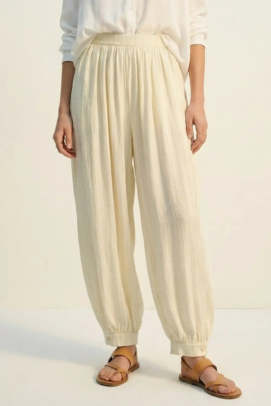 Cream Textured High-Waist Balloon Pants with Buttoned Cuffs - Pants