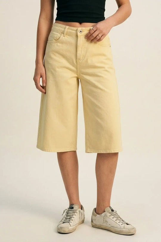 Stretch-denim Bermuda shorts in Butter Yellow - Pants