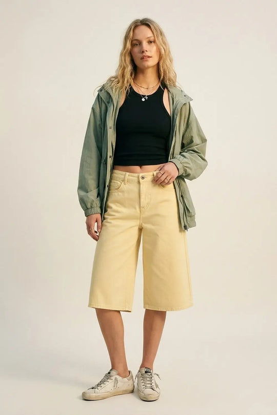 Stretch-denim Bermuda shorts in Butter Yellow - Pants