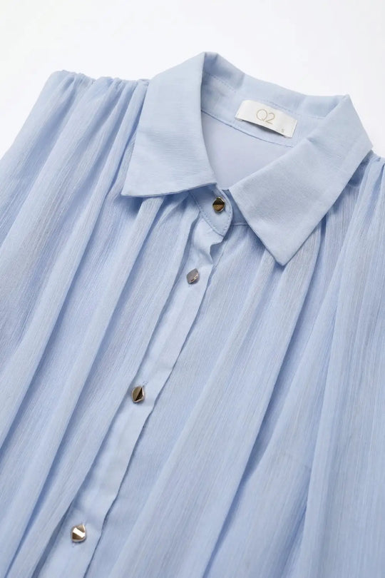 Sleeveless pleated blouse in light blue chiffon with buttons on the front regular fit - Shirts