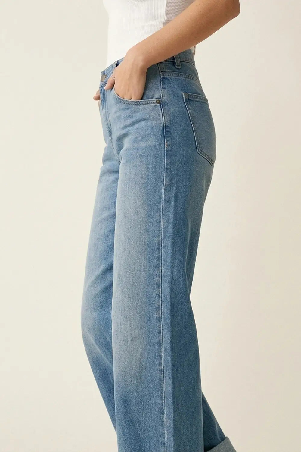 Mid-Wash Curved-Leg Jeans with Folded Hem Seam