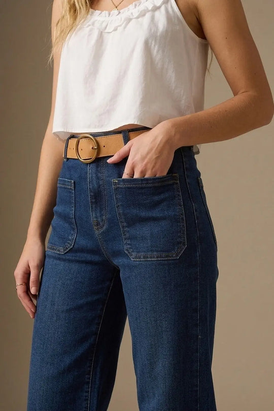Dark wash jeans with wide leg and pockets