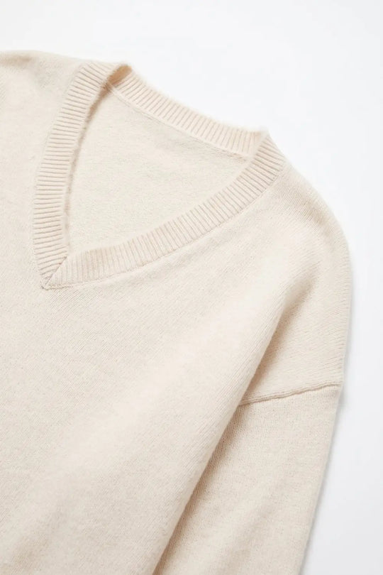 Cream V-Neck Sweater with Faux Fur Trim