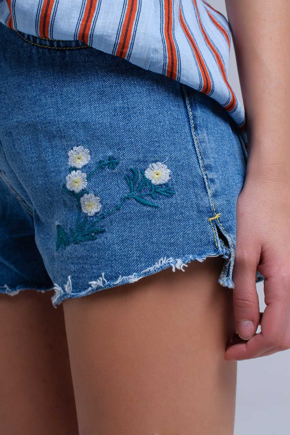 Denim mid wash blue short with floral design