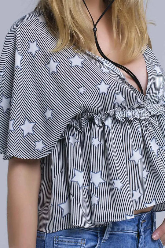 Black top with stars and ruffle - Tops