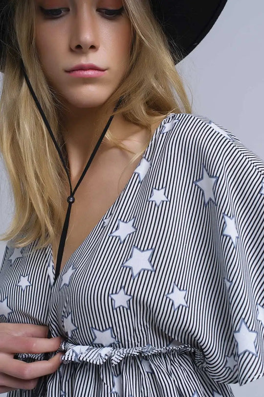Black top with stars and ruffle - Tops