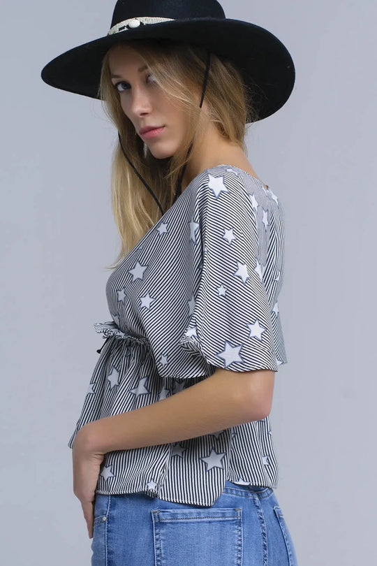 Black top with stars and ruffle - Tops