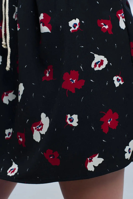Black mini skirt with floral pattern - Skirts