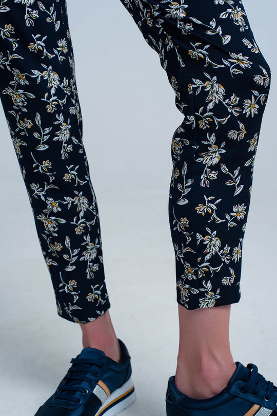Navy floral pants with a belt