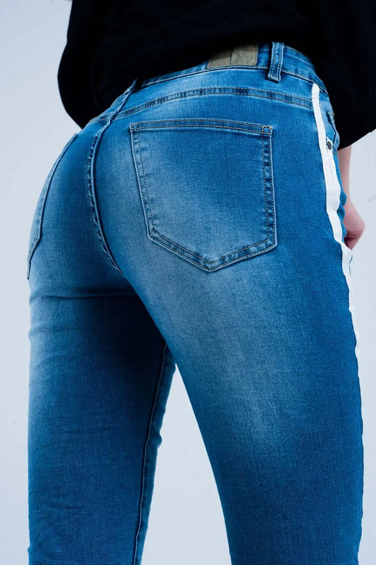 Skinny jeans with white side stripe