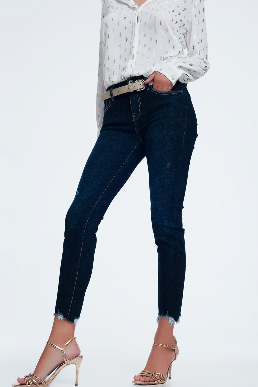 mid rise jeans in bright blue with raw hem