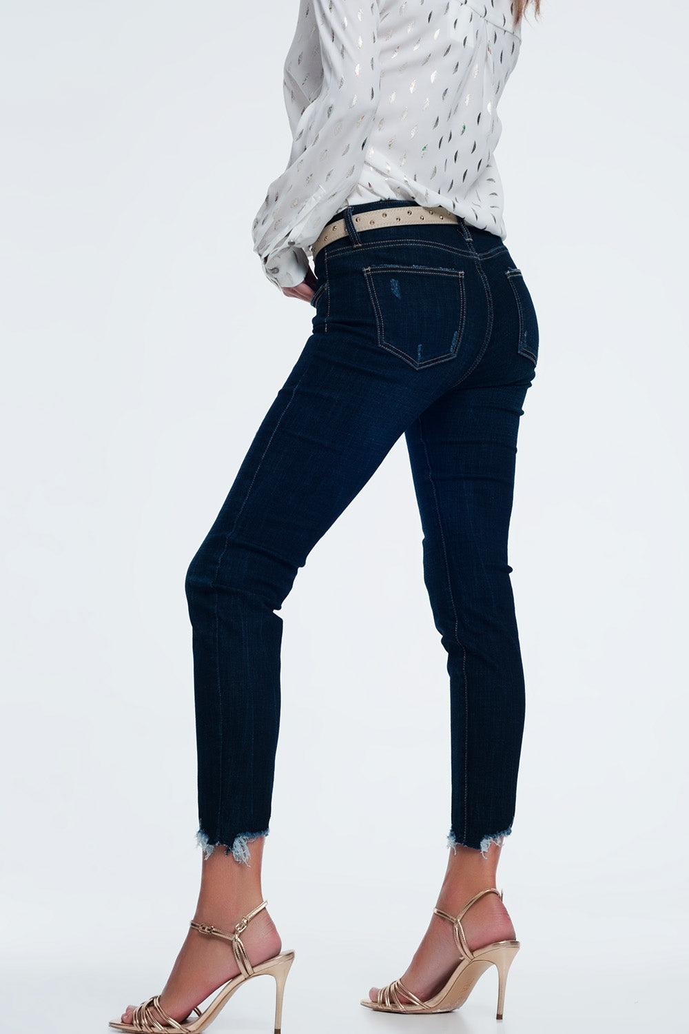mid rise jeans in bright blue with raw hem