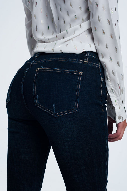 mid rise jeans in bright blue with raw hem