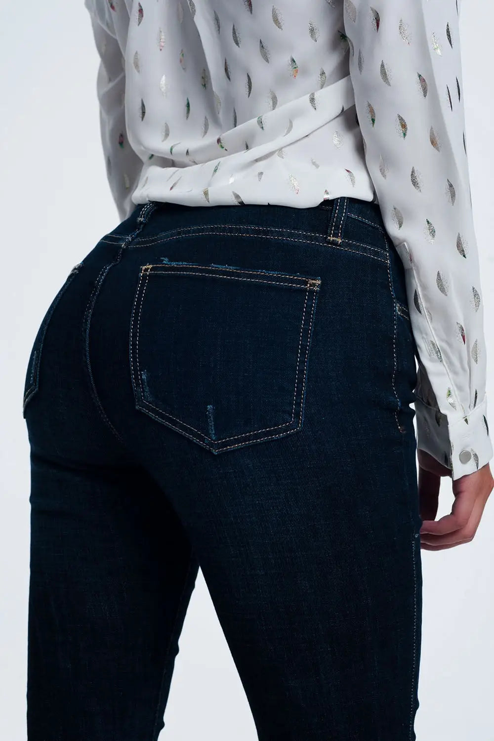 mid rise jeans in bright blue with raw hem