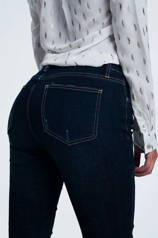 mid rise jeans in bright blue with raw hem