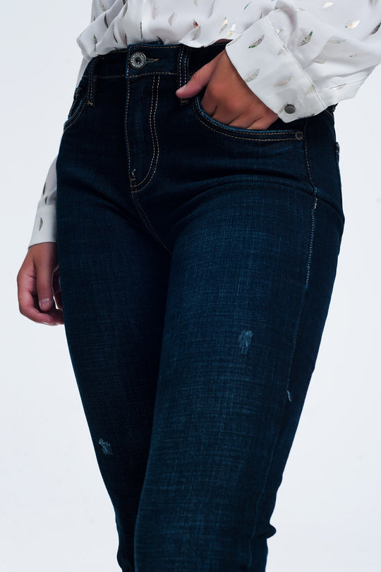 mid rise jeans in bright blue with raw hem