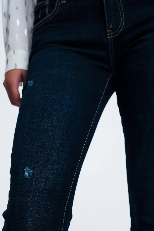 mid rise jeans in bright blue with raw hem