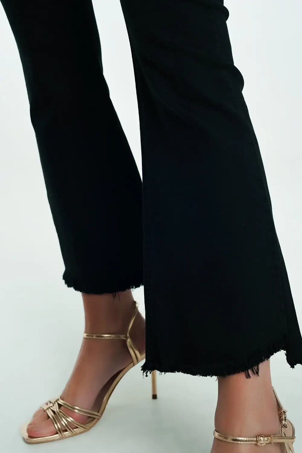 High rise raw hem flared jeans in black - Colored Jeans