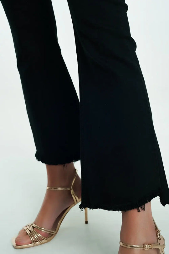High rise raw hem flared jeans in black - Colored Jeans