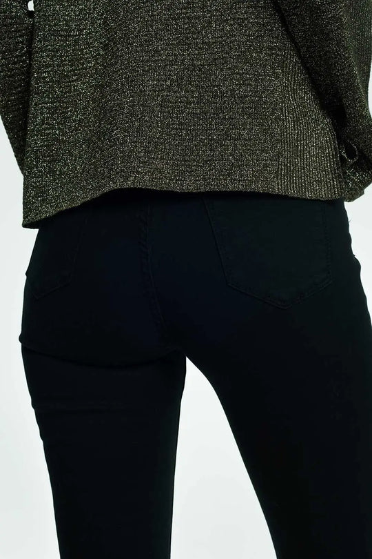 High rise raw hem flared jeans in black - Colored Jeans