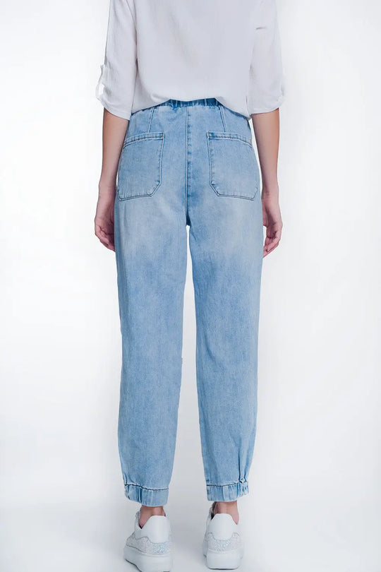 Heavily ripped boyfriend jeans in light denim