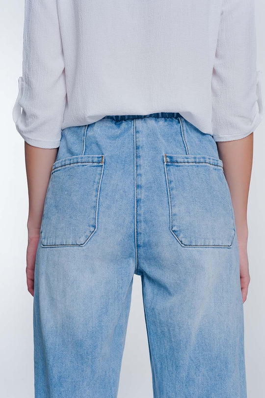 Heavily ripped boyfriend jeans in light denim