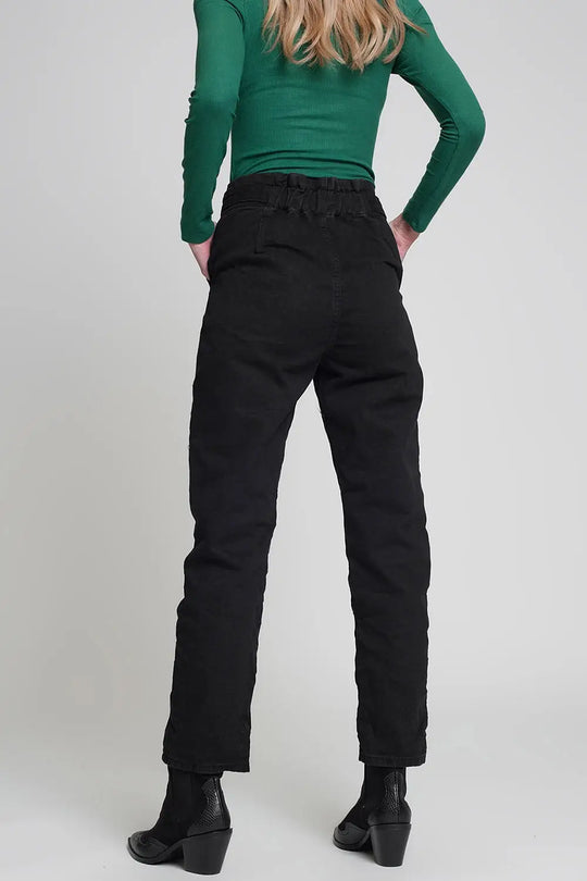 Jeans with paper bag waist and button details in black - Colored Jeans