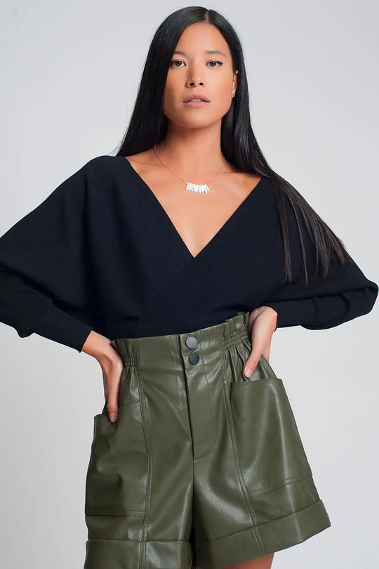 Knitted sweater with wrapped V-neck in black - Sweaters