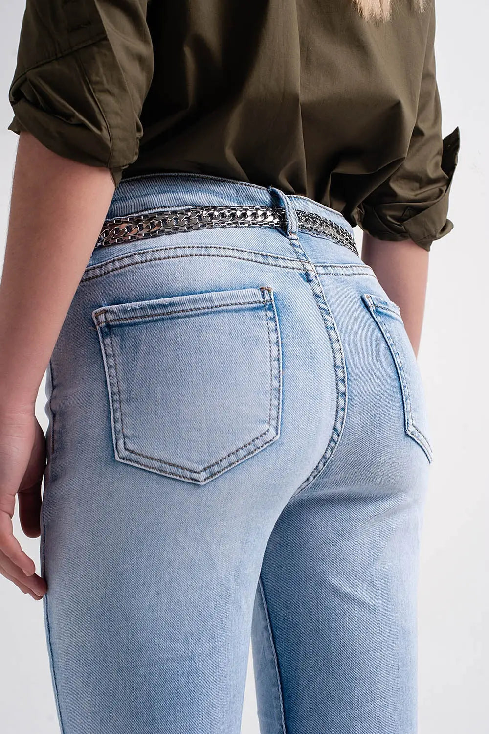 Straight leg jeans with folded ankles in light denim