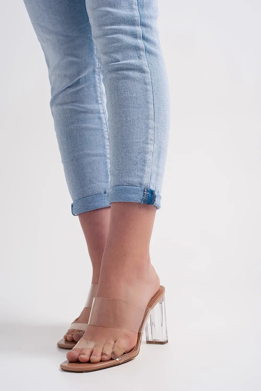 Straight leg jeans with folded ankles in light denim