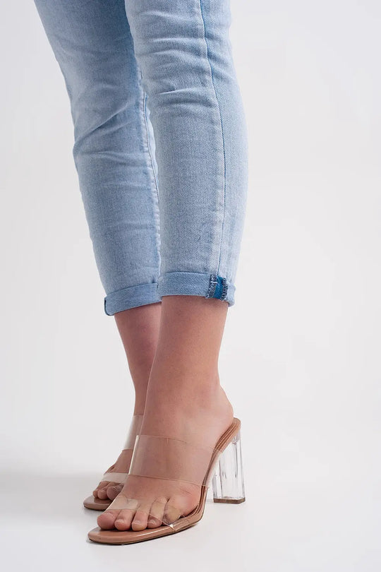 Straight leg jeans with folded ankles in light denim