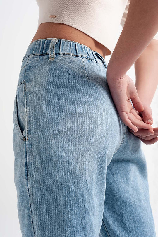 Jean with double waistband in blue with rips