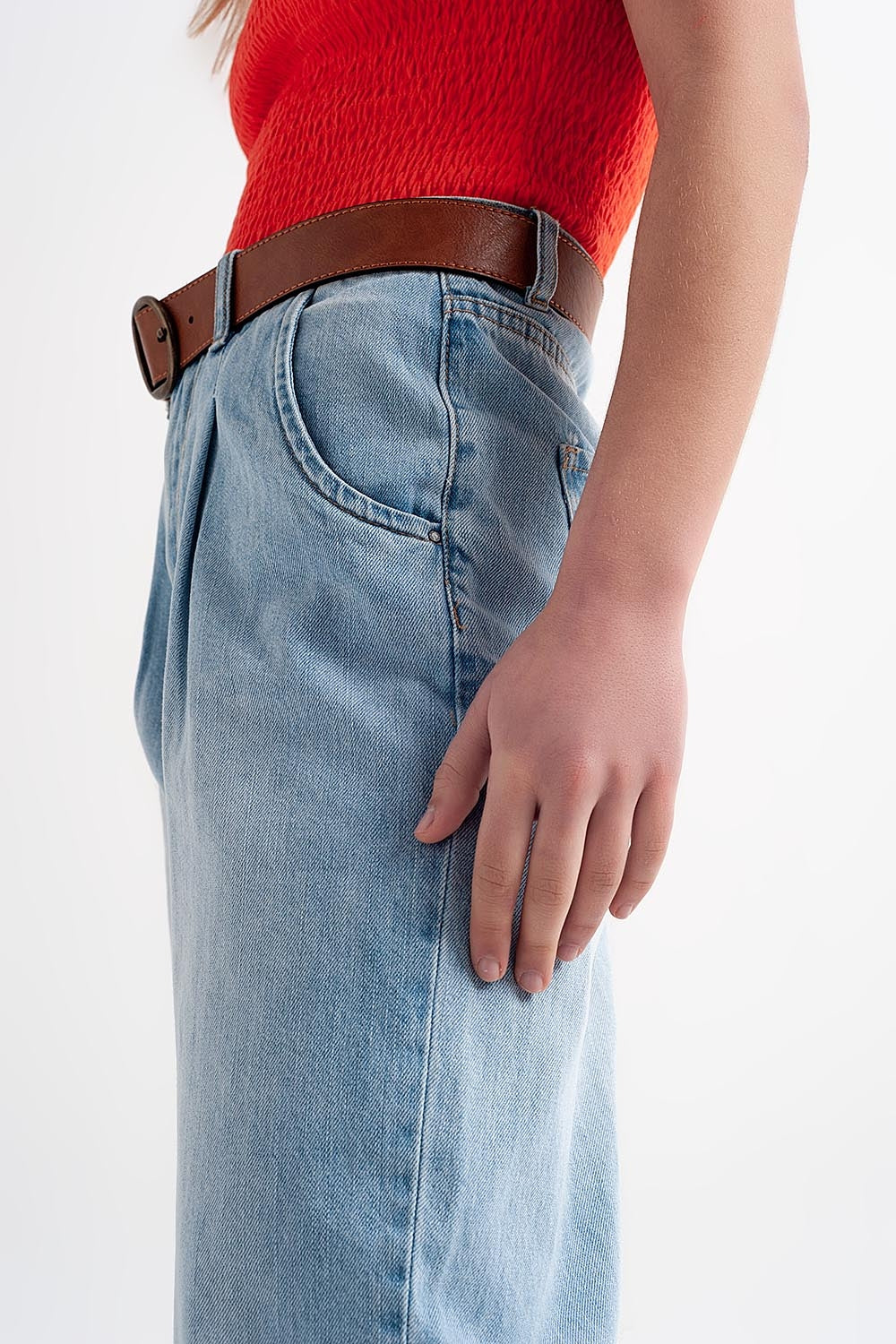 High rise relaxed jeans with pleat front in bleach wash